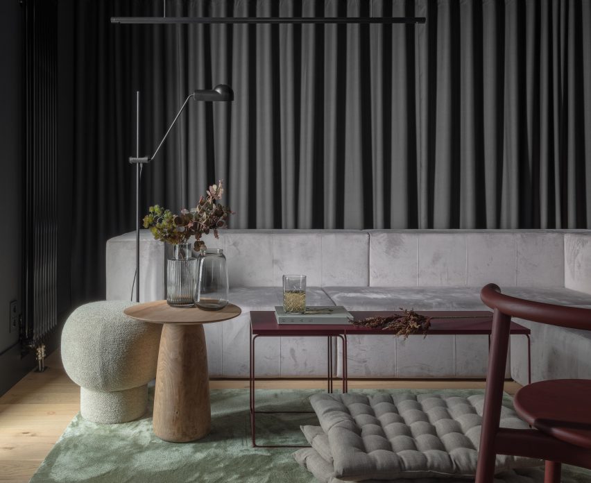 Curtains are used to soften the concrete shell