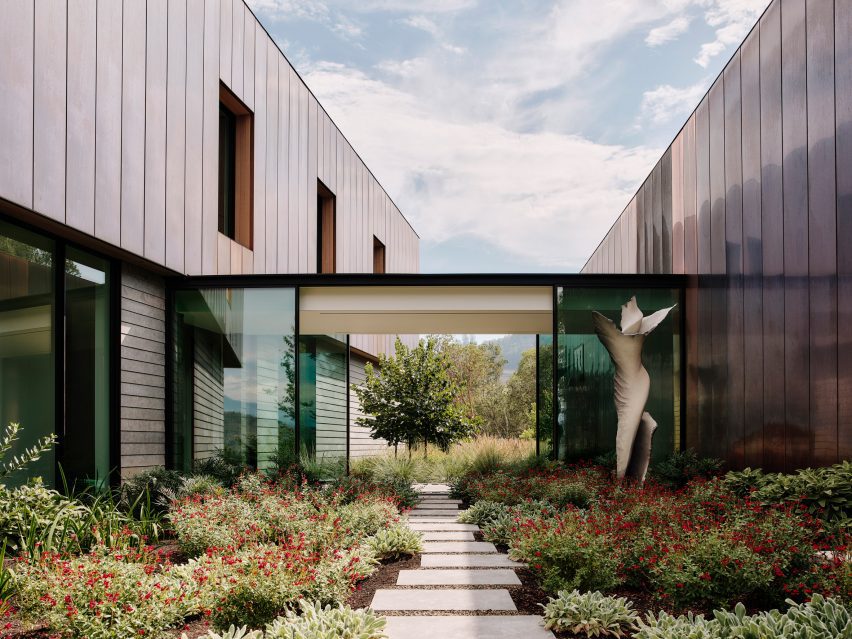 A house with connecting glass hallway