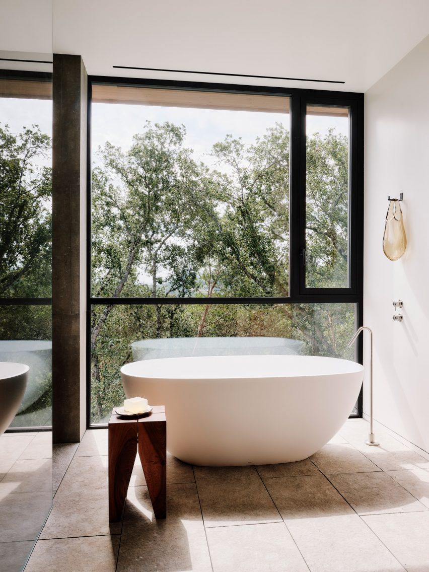 A bathroom with freestanding tub
