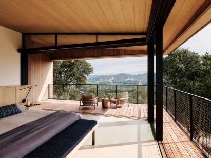 A bedroom with open walls