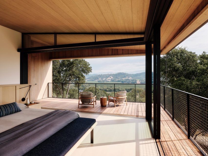 A bedroom with open walls