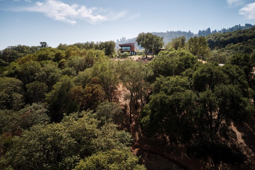 A hill with a house on top of it