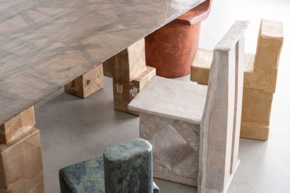 Close-up of chairs next to a table