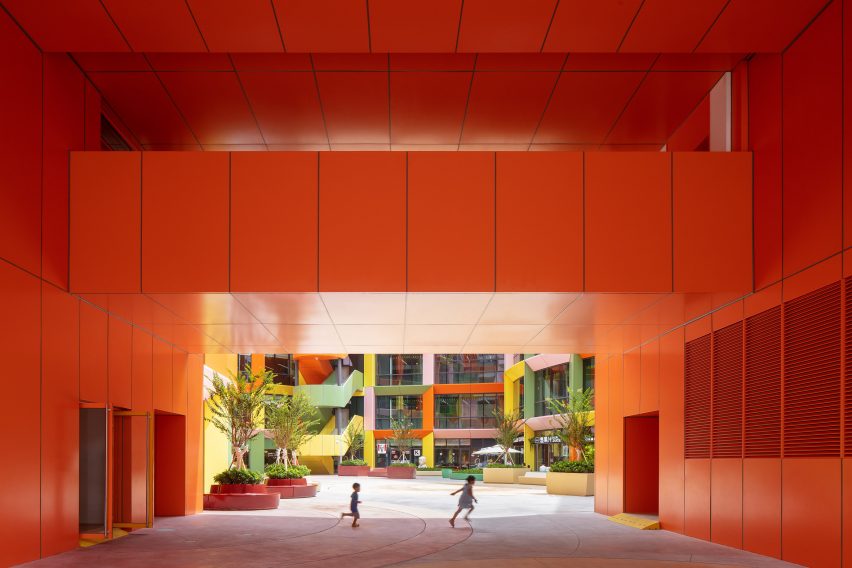 Orange semi-outdoor space at Shenzhen Women and Children's Centre by MVRDV
