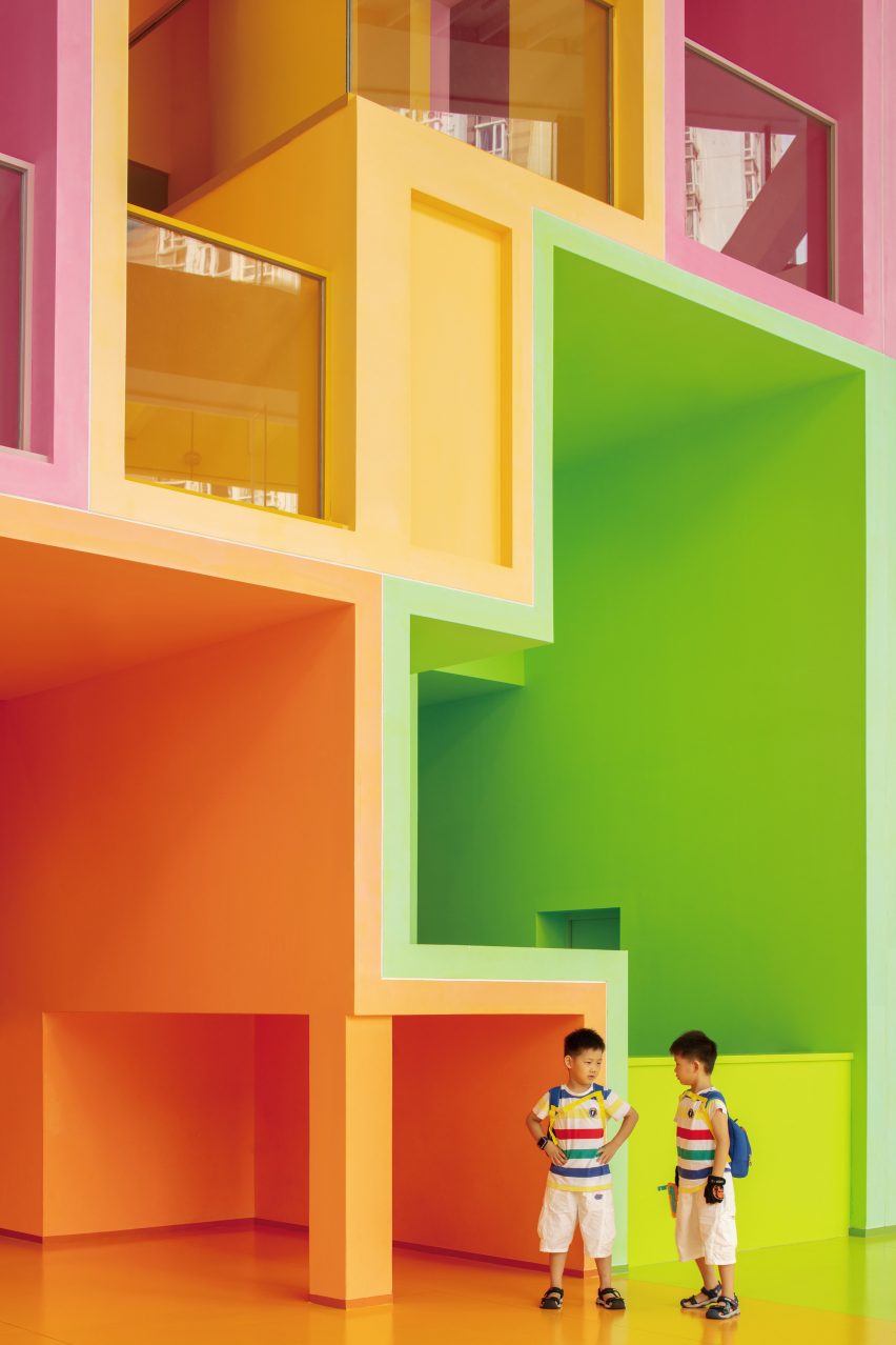 Yellow, green and orange gridded play wall