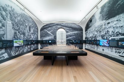 A central table with illuminated skylines