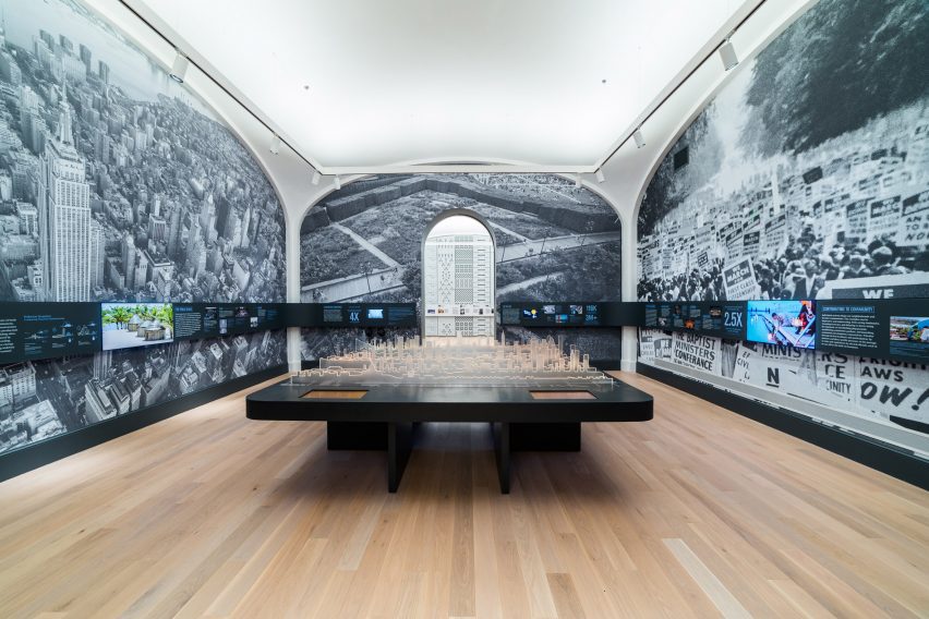 A central table with illuminated skylines