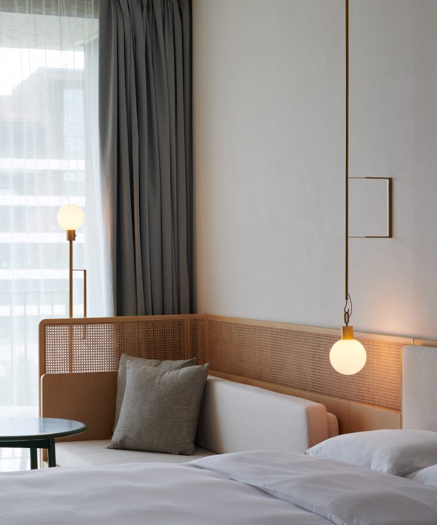 Hotel bedroom with rattan headrest