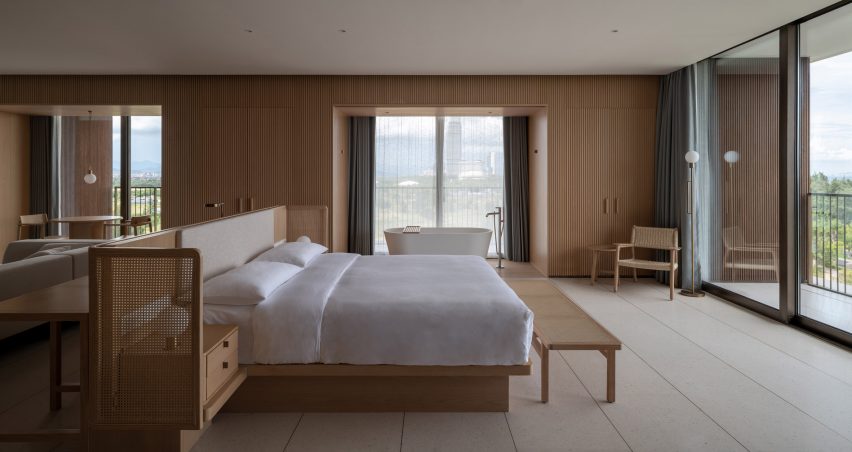 Wood-lined hotel bedroom