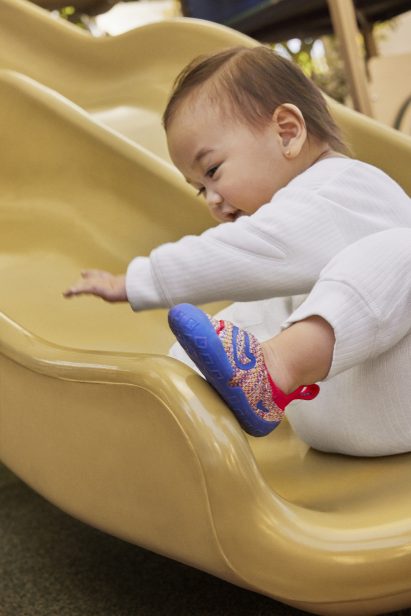 Child wearing Nike Swoosh 1