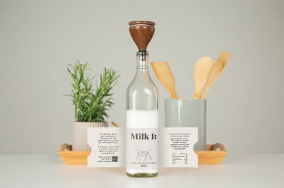 Photograph showing milk bottle with cow on label