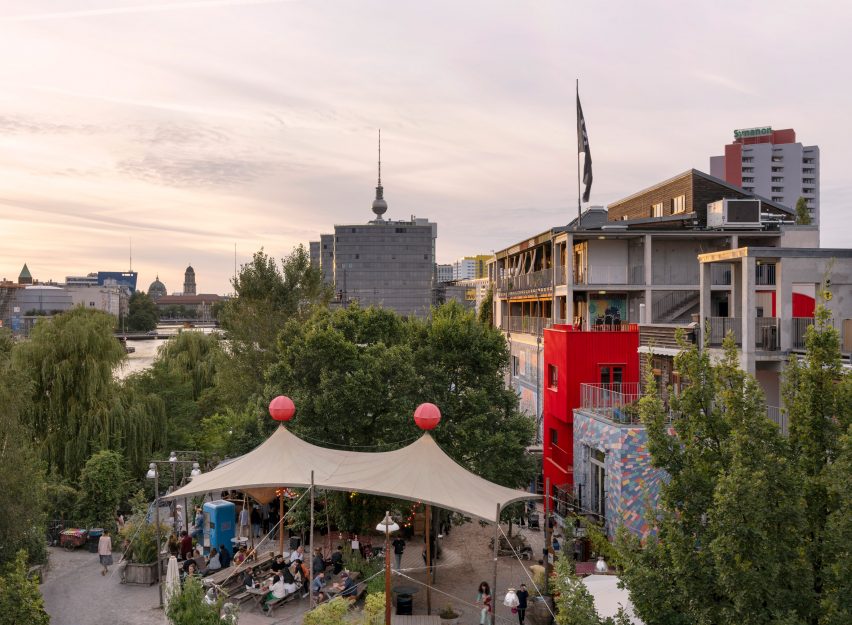 Red timber Haus 2+ office building by Office Park Scheerbarth