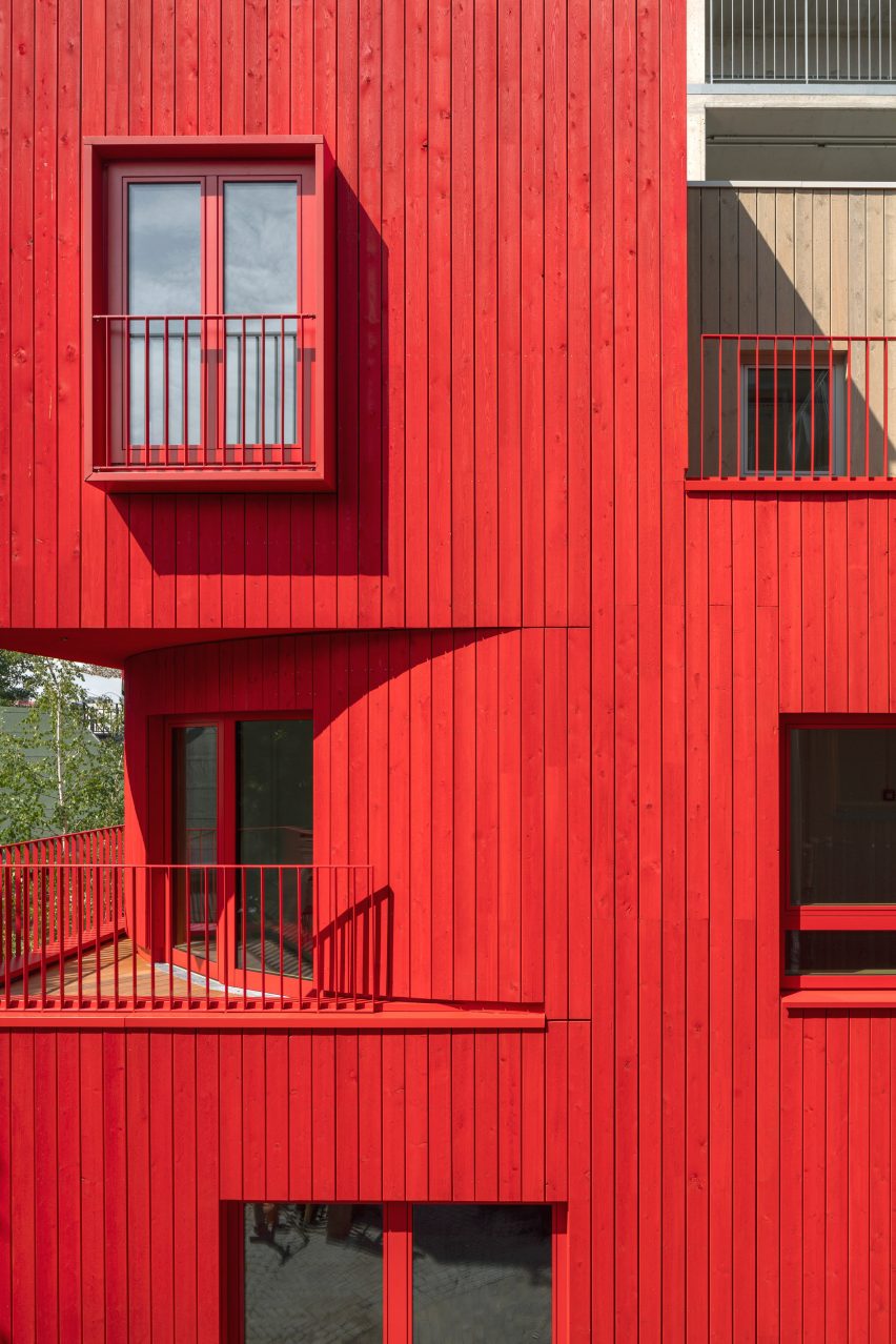 Red wood cladding on the Haus 2+ office building by Office Park Scheerbarth