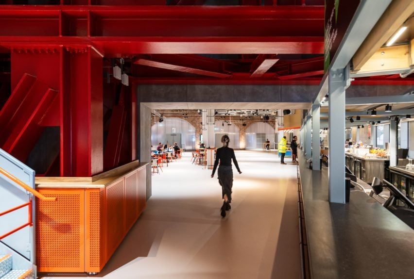 Foyer with red steel structure at Aviva Studios by OMA