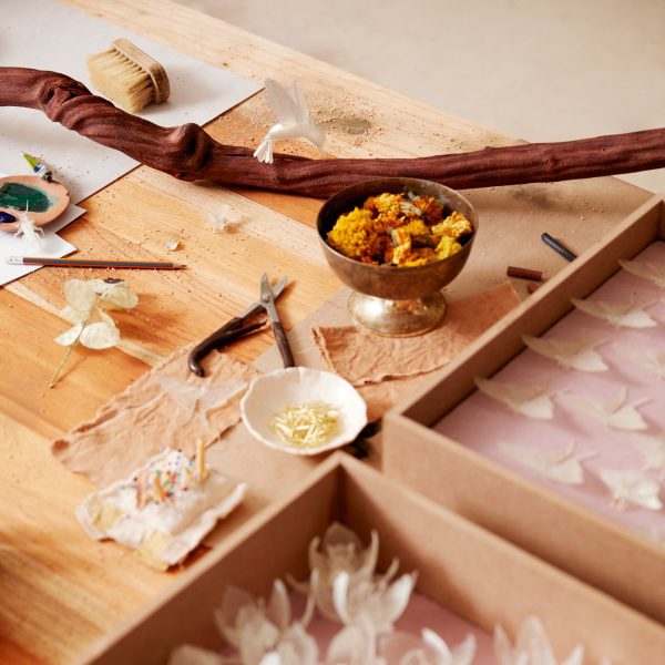 Work bench with craft items on it