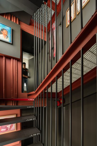 Steel staircase in skinny hotel