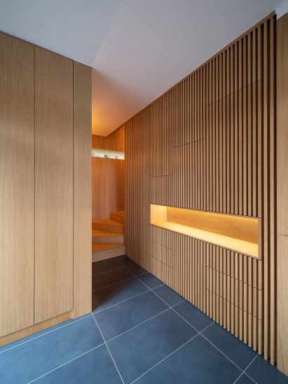 RAPA Architects' thatch roof, cantilevered holiday home in Hungary