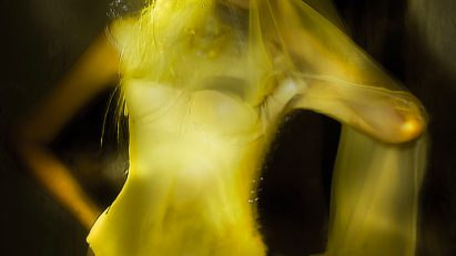 Haunting yellowish image of a fashion model
