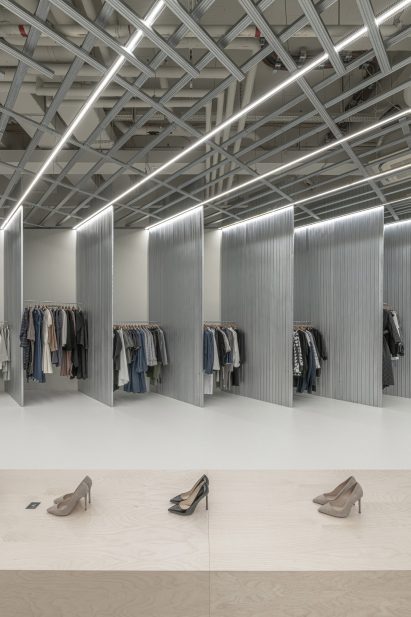 Displays of clothes and shoes inside SOM Store by D415 in Bratislava