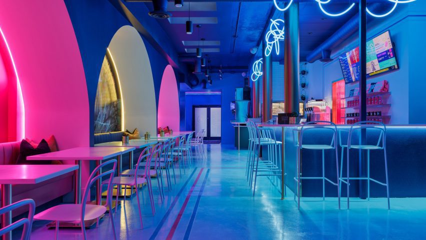 Neon lighting illuminates Strip Joint Chicken by Amanda Hamilton