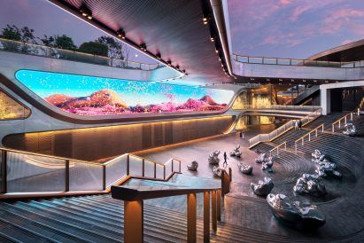 Outdoor area with staircases and large screen