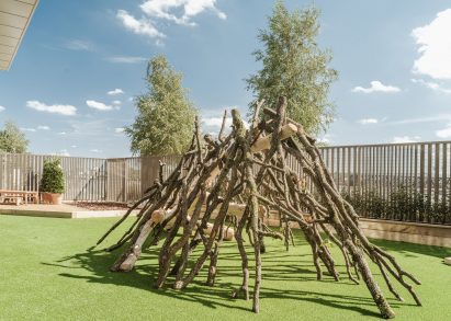 Twig house in kindergarten play area
