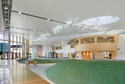 A floor with varying levels covered in faux grass