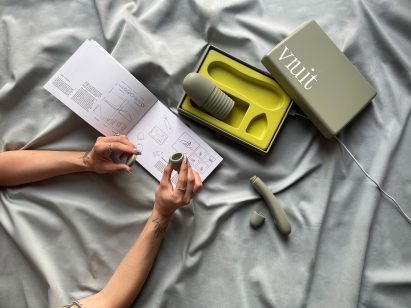 Person looking at products inside Vruit sex toy set for at-home artificial insemination by Juliane Kühr