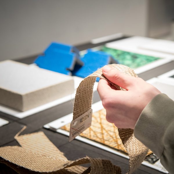 Photo of hand holding fabric at Architect@Work Düsseldorf 2023
