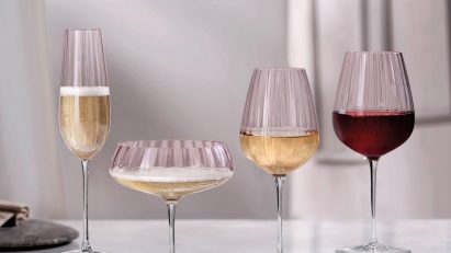 Four wine glasses in dusty rose