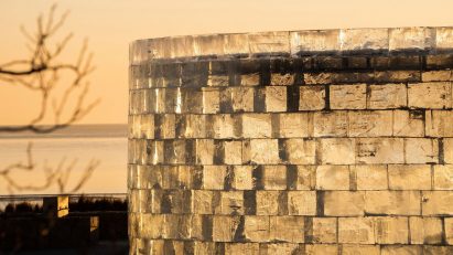 Close-up of ice block pavilion on a beach
