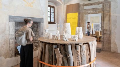 Medprostor stacks firewood for Ljubljana design biennial exhibition