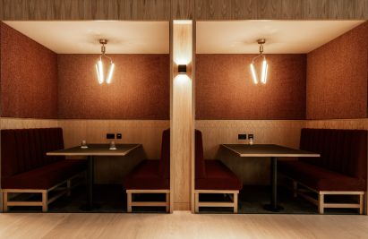 Orange and green-hued office interior by 'Kin