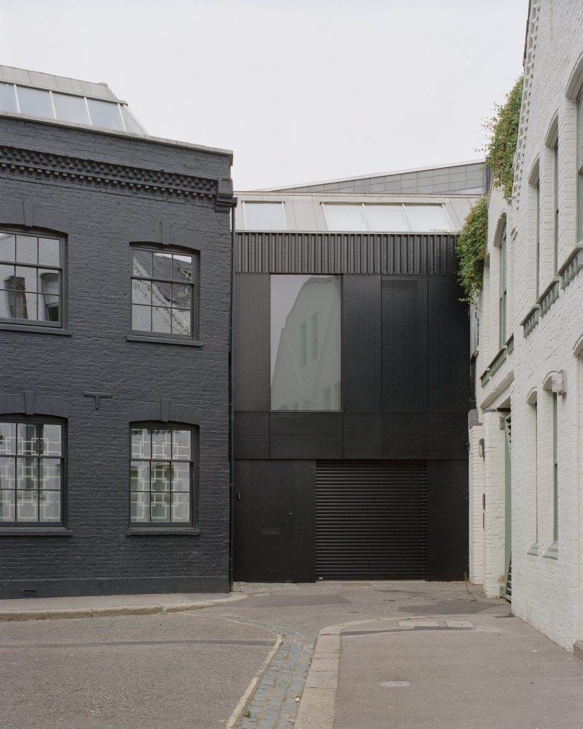 Restored warehouse facade at Camden Workshop by McLaren Excell