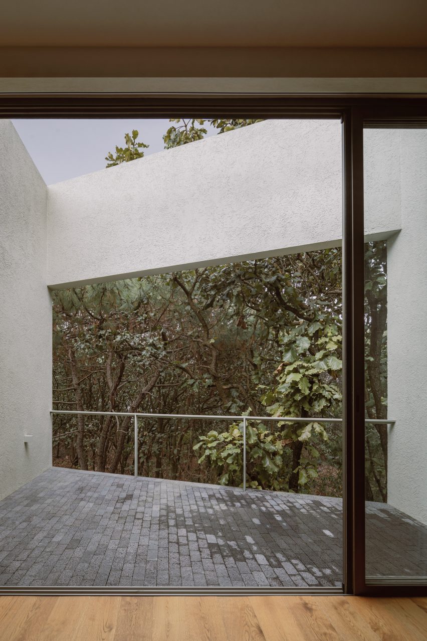 Outdoor terrace overlooking a forest