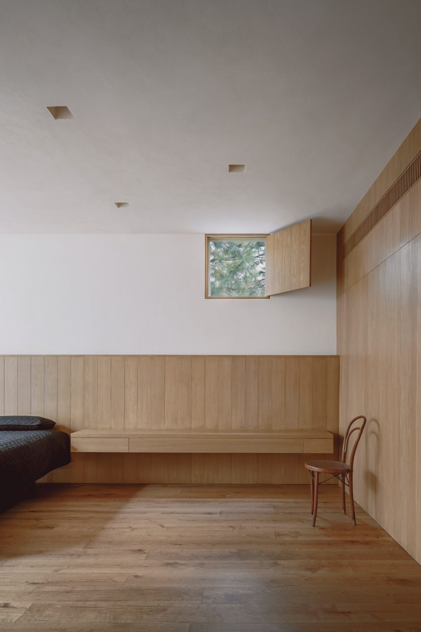 Bedroom with wood panelling