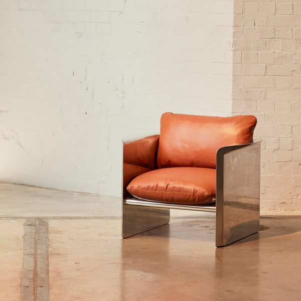 Metal chair with leather cushions