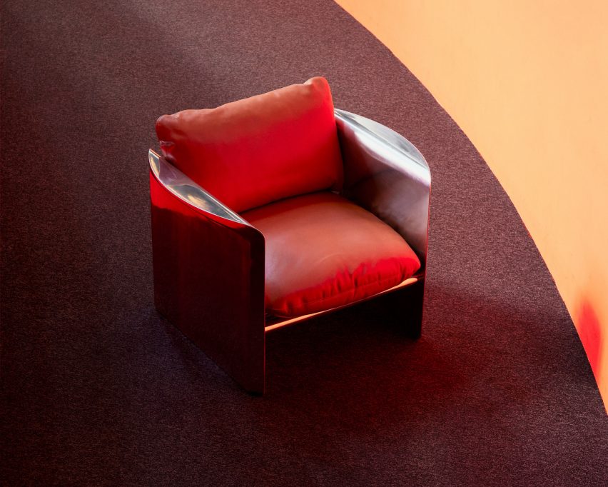 Metal chair with leather cushions