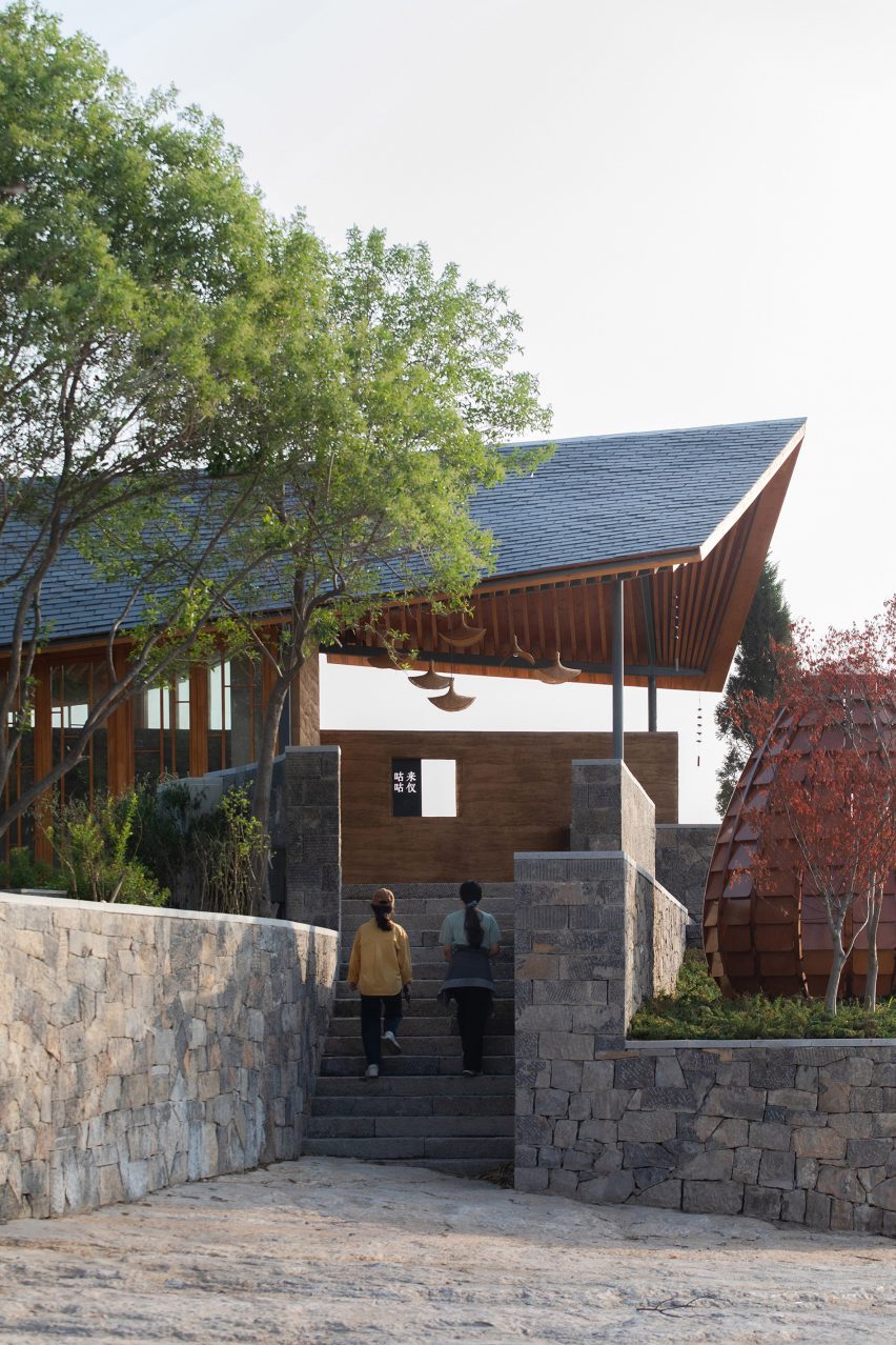 Stone pathway leading to the Dapi Mountain Restaurant by Galaxy Arch