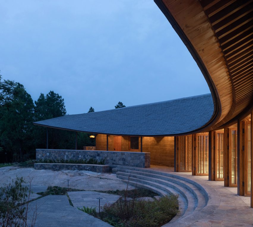Curving exterior of Dapi Mountain Restaurant by Galaxy Arch