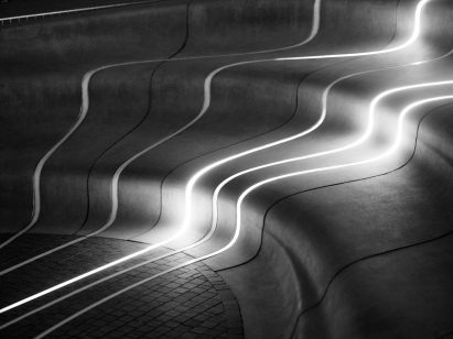 Curved concrete steps of lighting installation in Olso