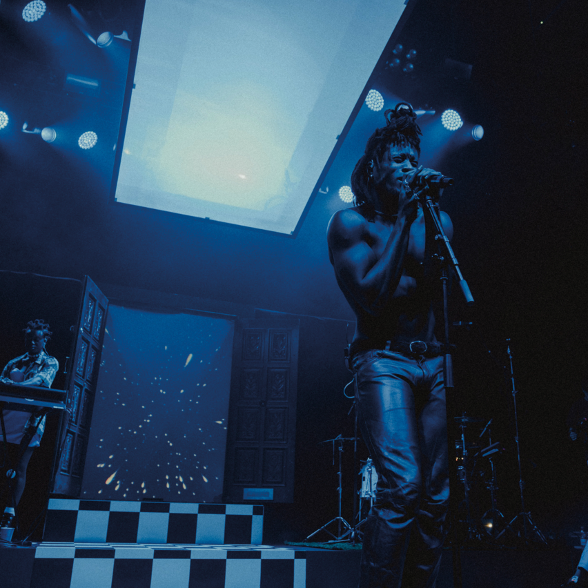 Musician Obongjayar performing on a set by The Unlimited Dream Company