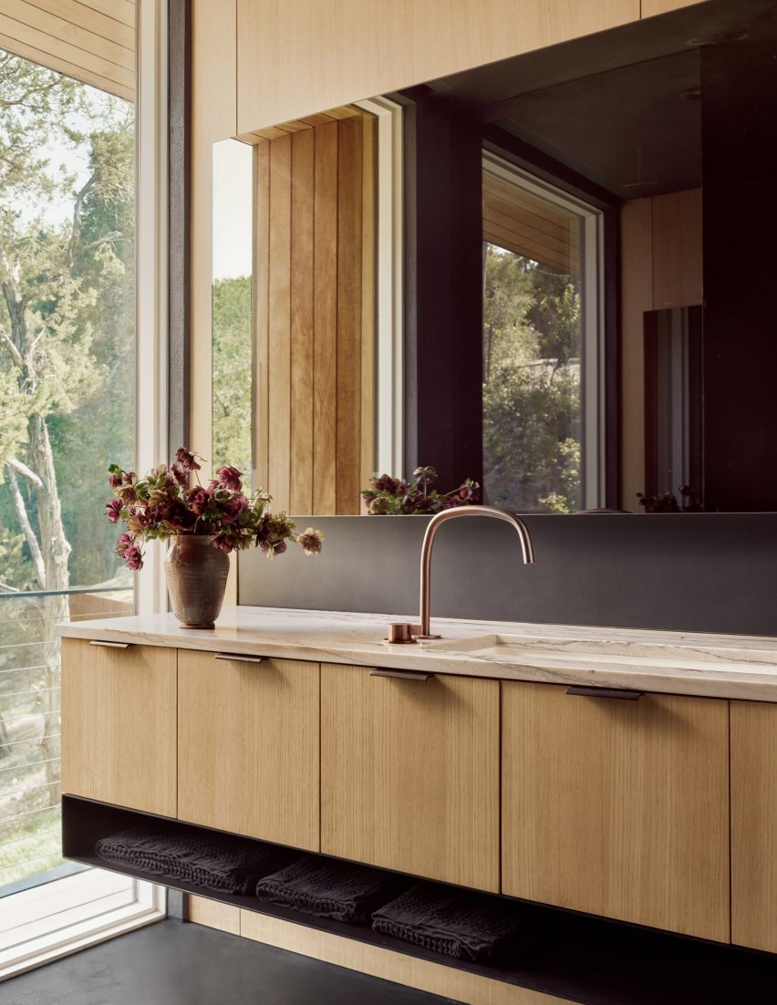 dark gray walls with light wood cabinetry