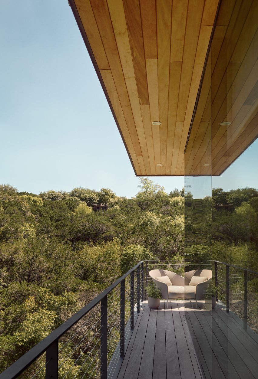 a walkway looking over forests