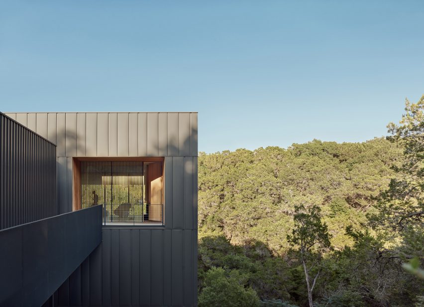 window in house with steel cladding