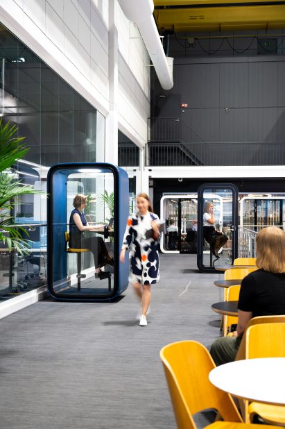 Office worker in a Framery meeting pod