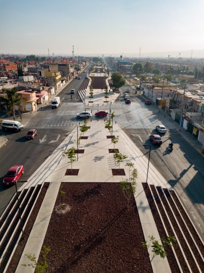 Walkway from above with cars turning