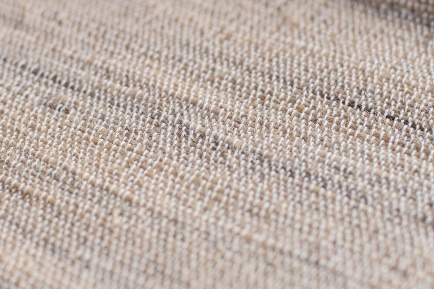Photo of a pale woven textile made of hair by Human Material Loop