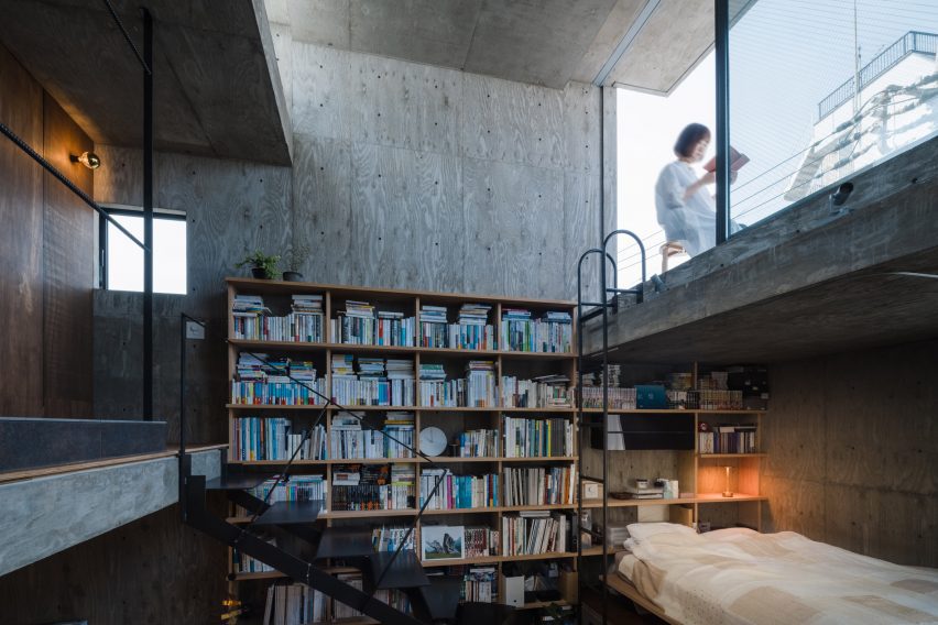 Bookcase wall in a concrete home