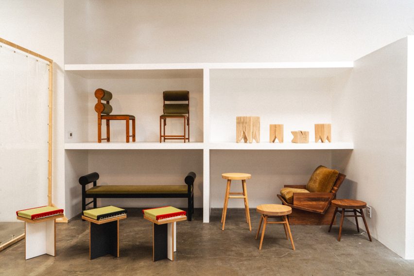 Furniture displayed in white shelves